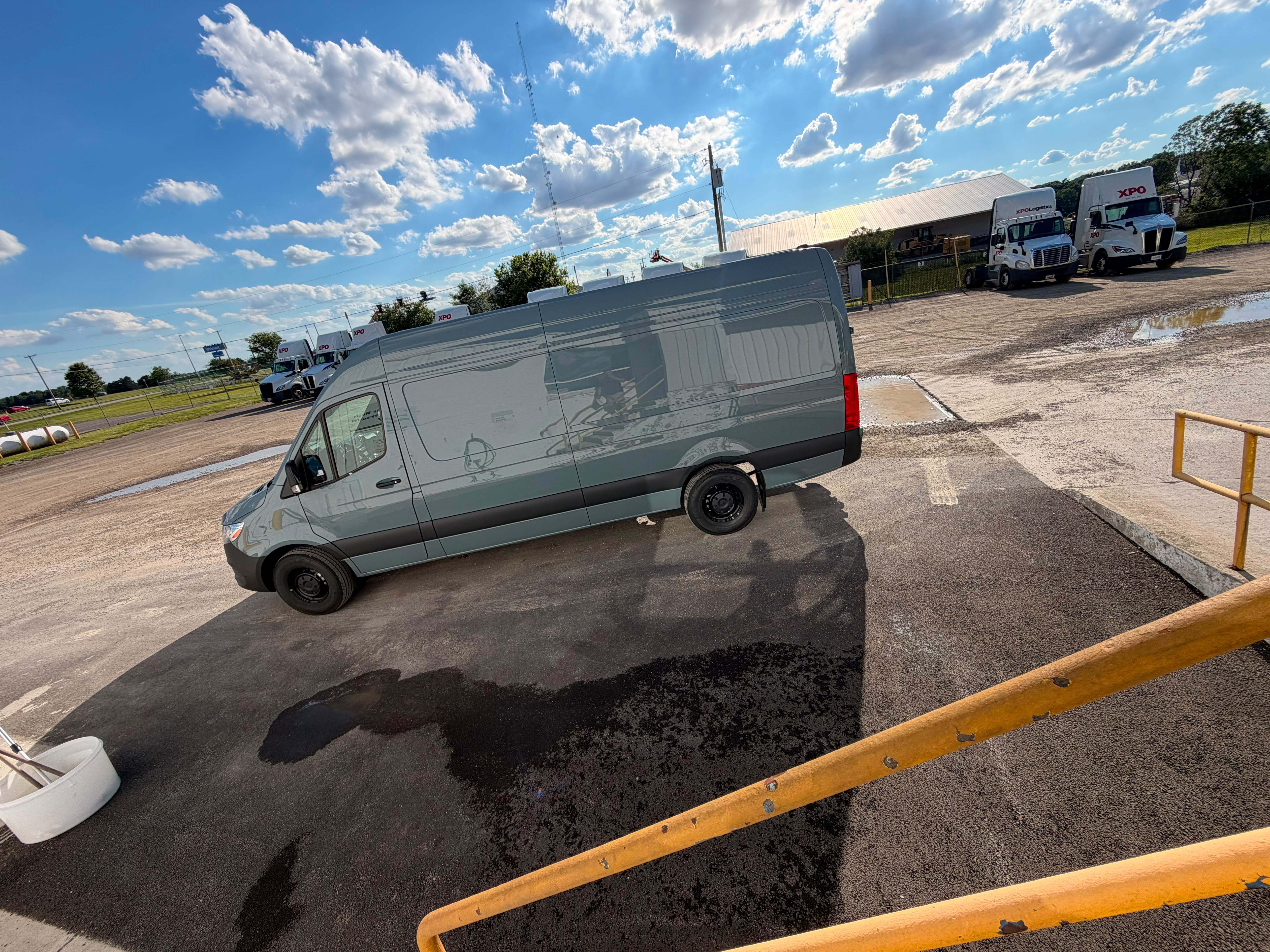 High-roof Mercedes Sprinter cargo van seen from the side